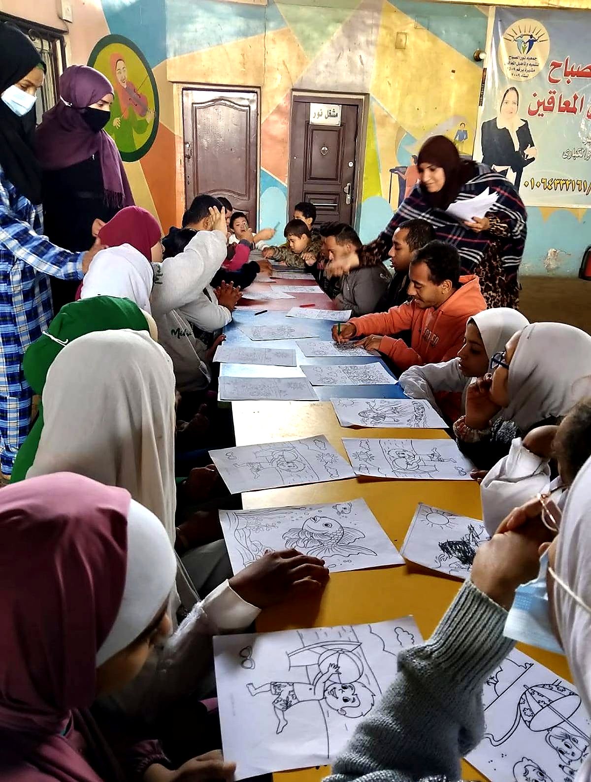 Children at a Nor El Sabah coloring workshop