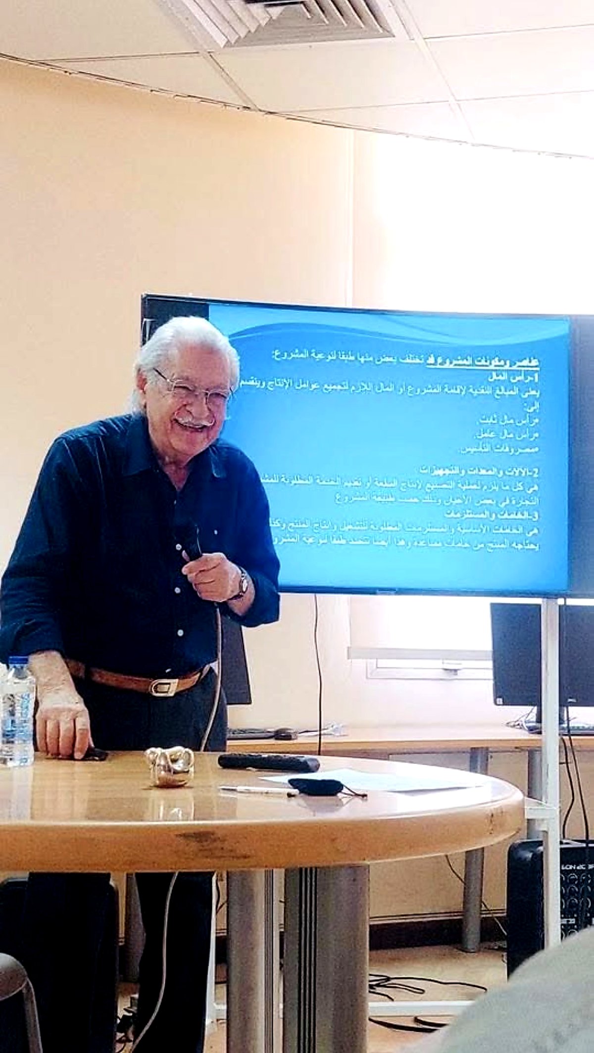 A speaker presenting an SME-management session